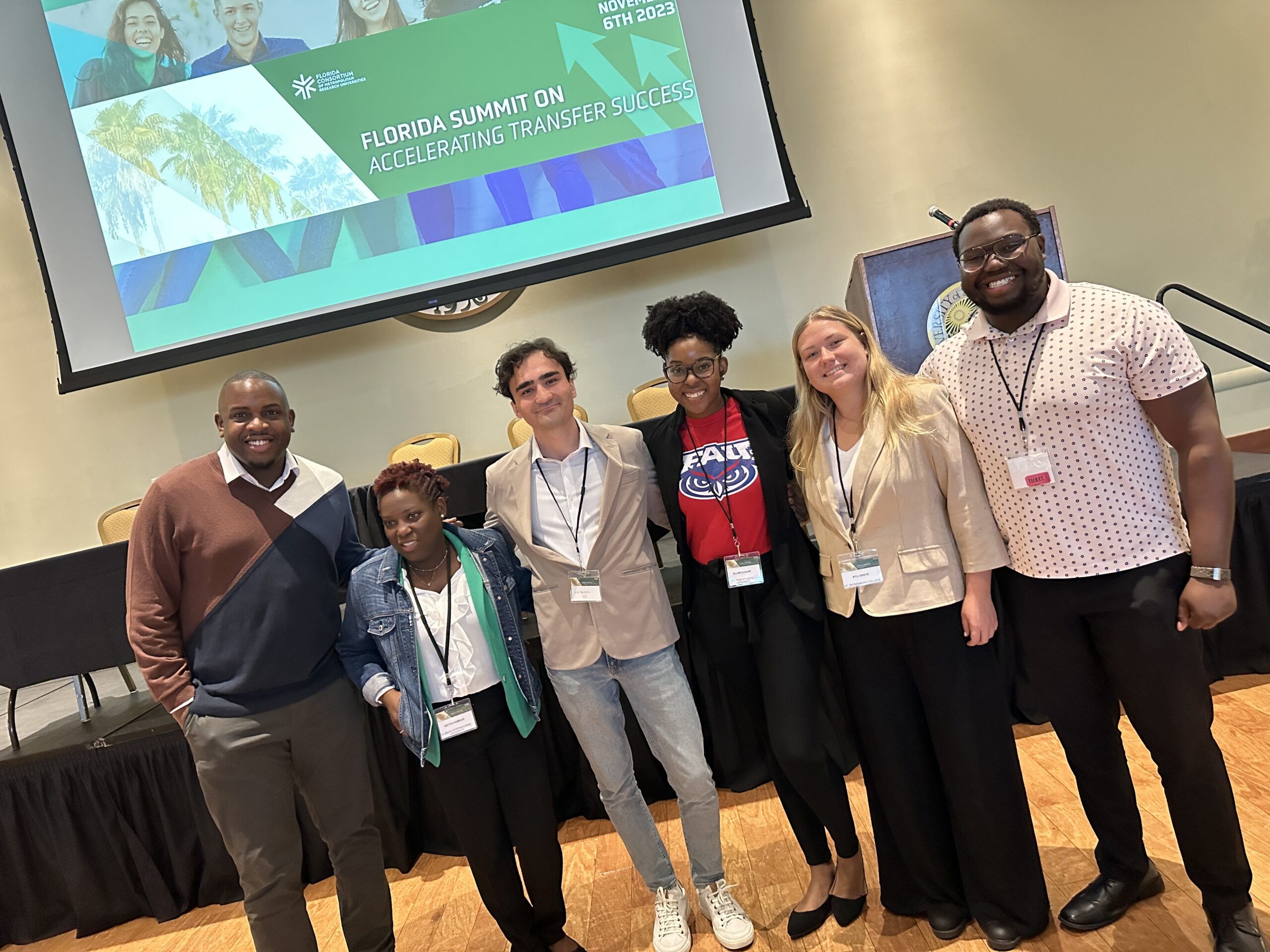 A group of university students posed after a student panel at the 2023 Florida Summit on Accelerating Transfer Success in the Marshall Student Center on the USF Tampa campus.